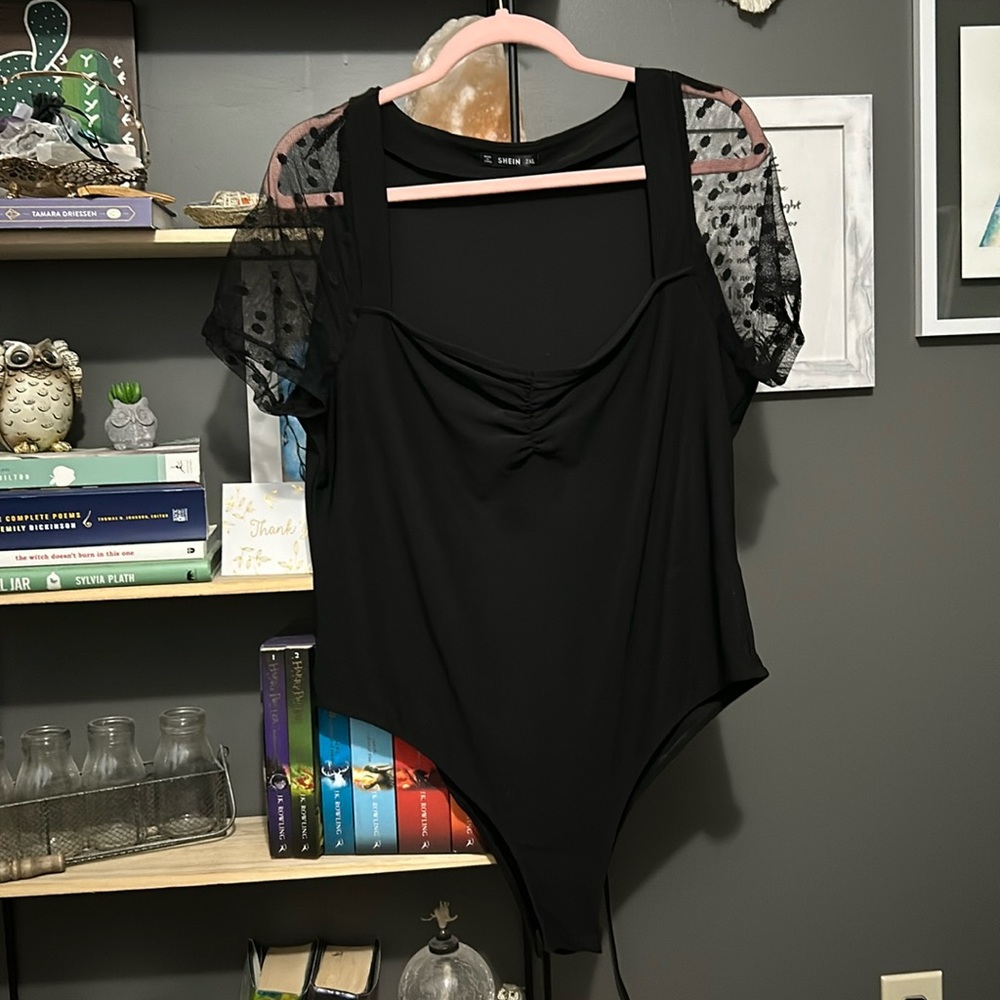 2XL, Ruched front body suit, with Polk-a-dot mesh sleeve detail.